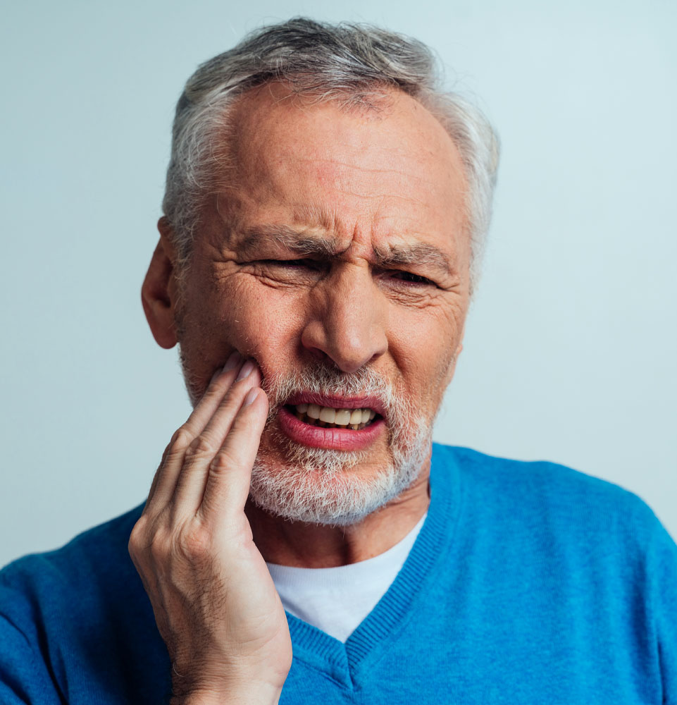 patient with tooth pain before procedure
